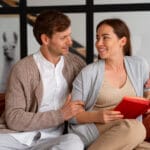 imgi_6_woman-reading-book-with-husband-her-1