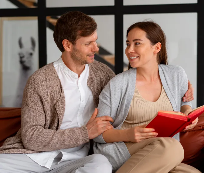 Marriage Therapist in Mississauga: How Professional Marriage Counseling Can Strengthen Your Relationship 4 imgi_6_woman-reading-book-with-husband-her-1